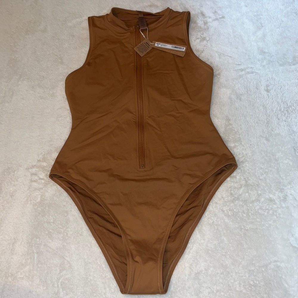 NWT SKIMS signature swim zip front sleeveless one piece